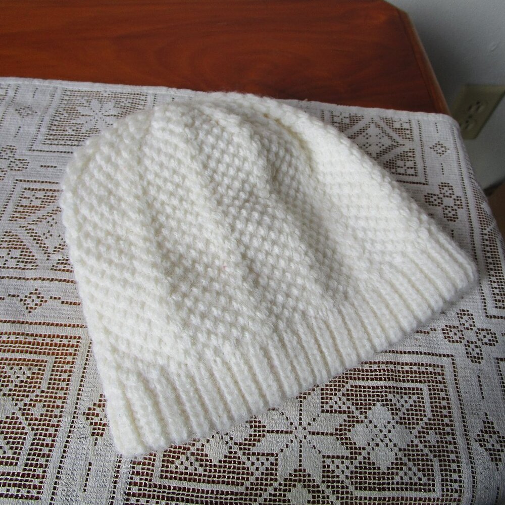 White cable knit beanie cap hat. One size fits most.